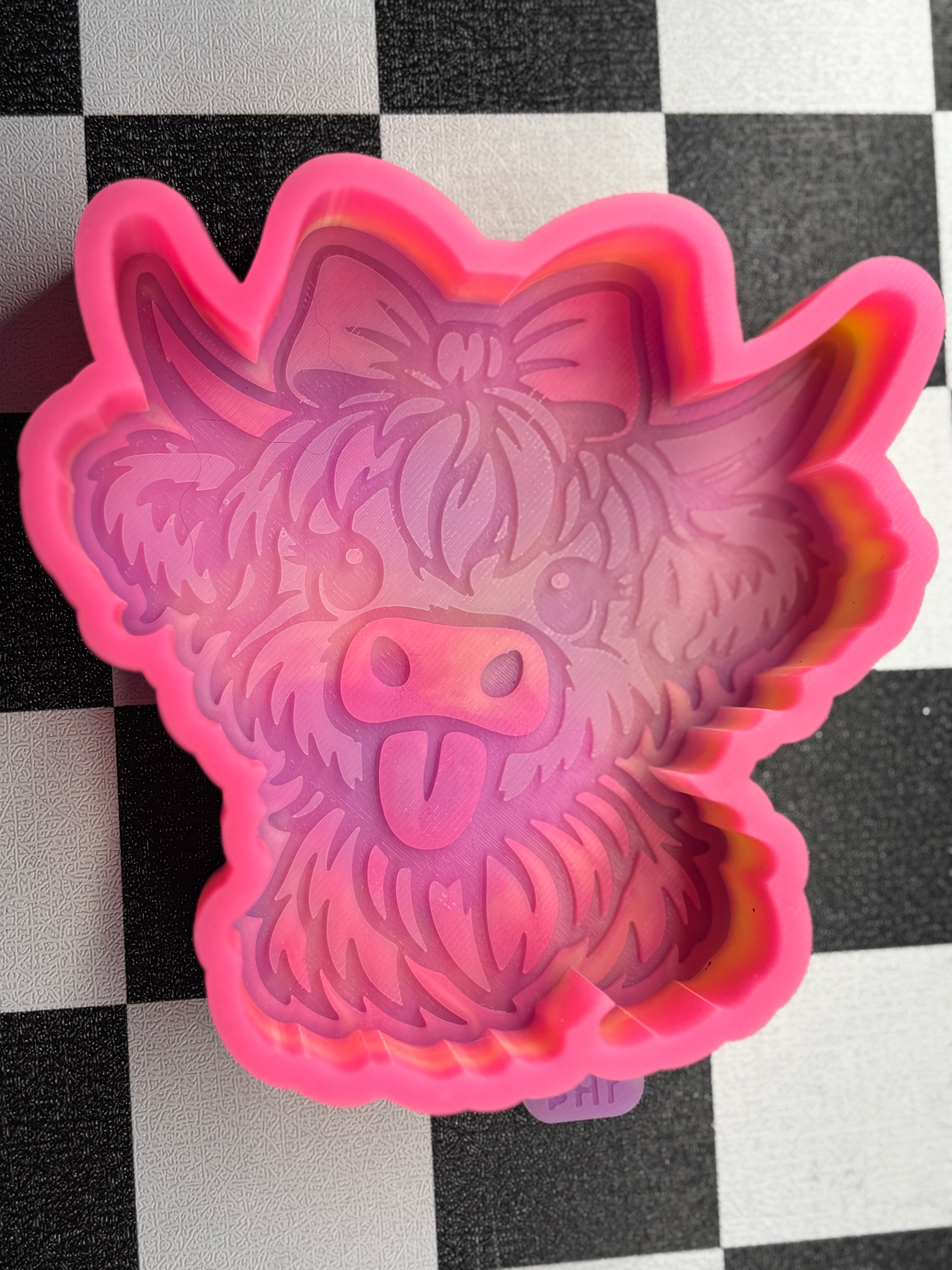 Custom highland tongue cow freshie mold