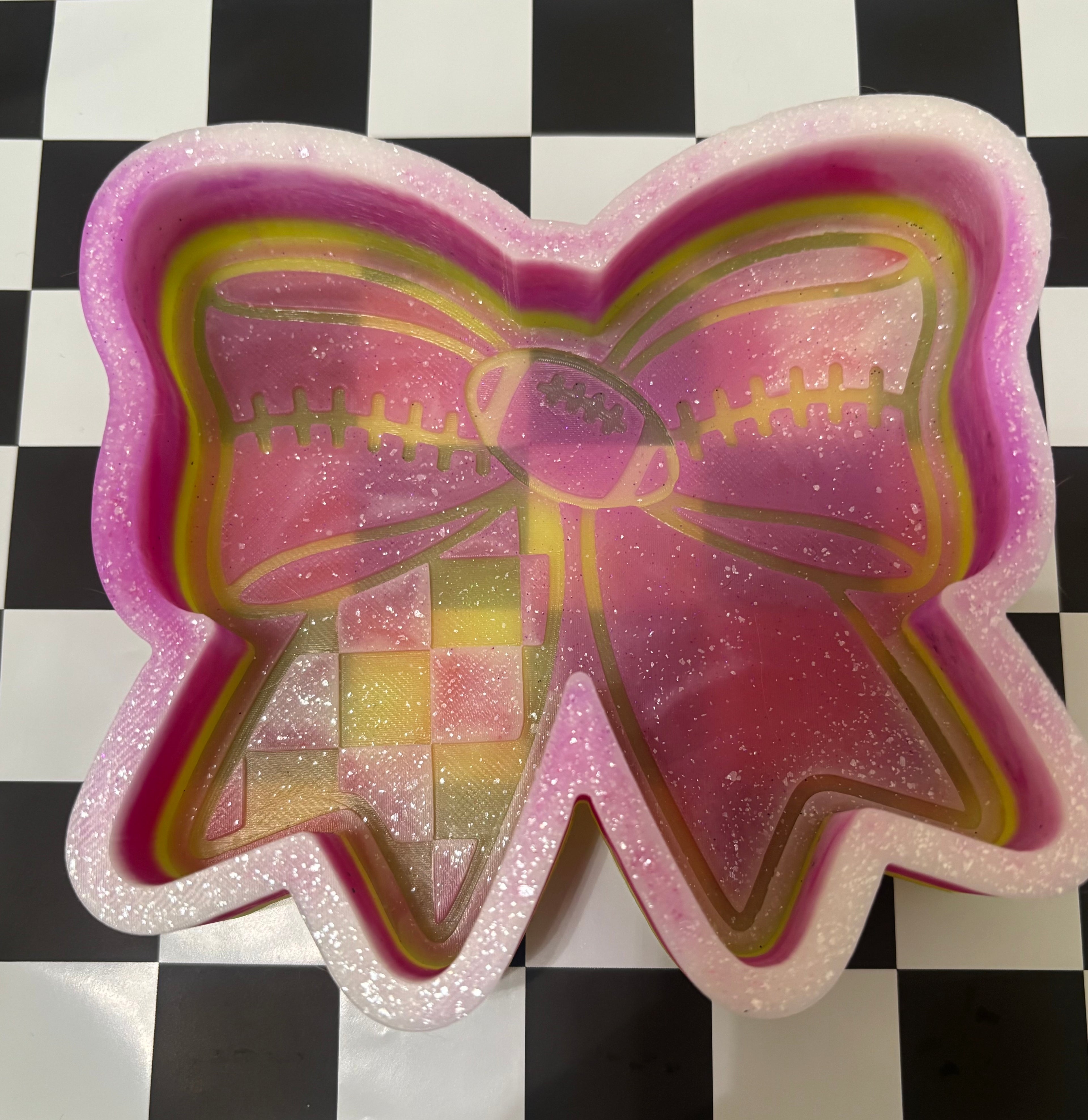Custom football bow mold