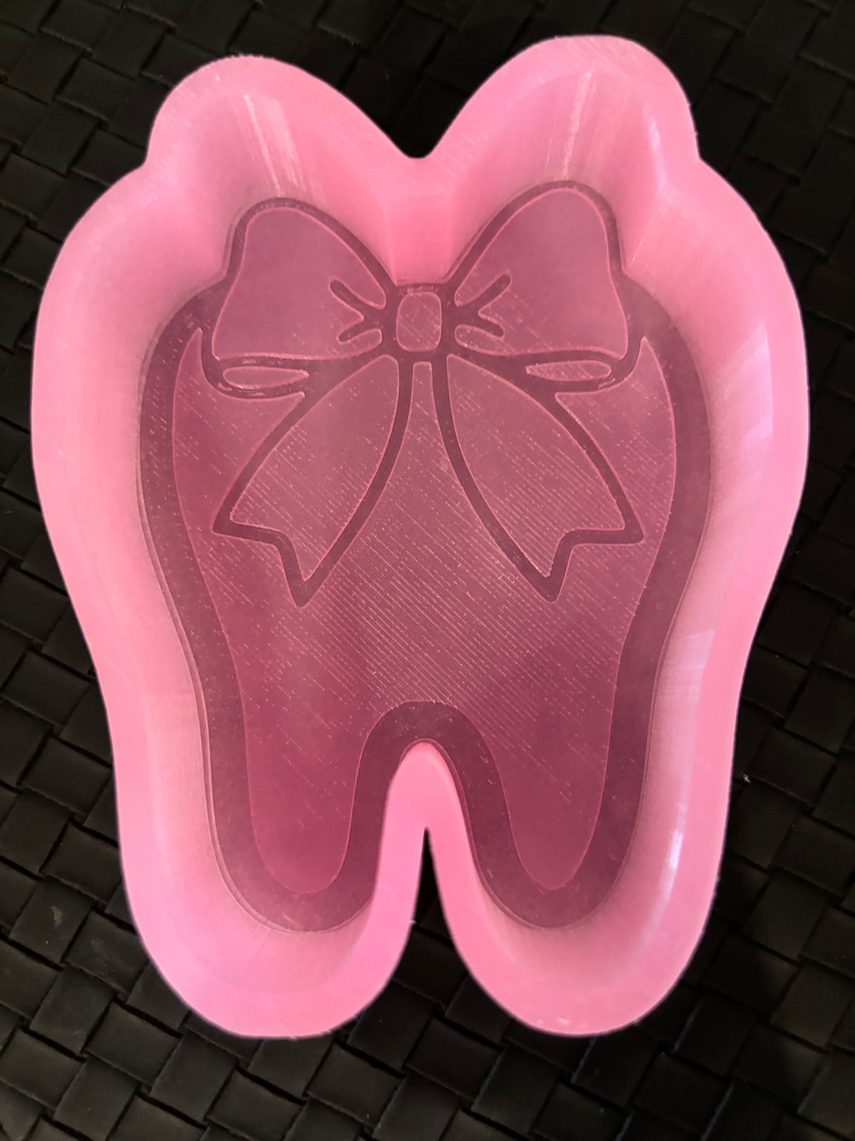 Custom tooth with bow freshie mold