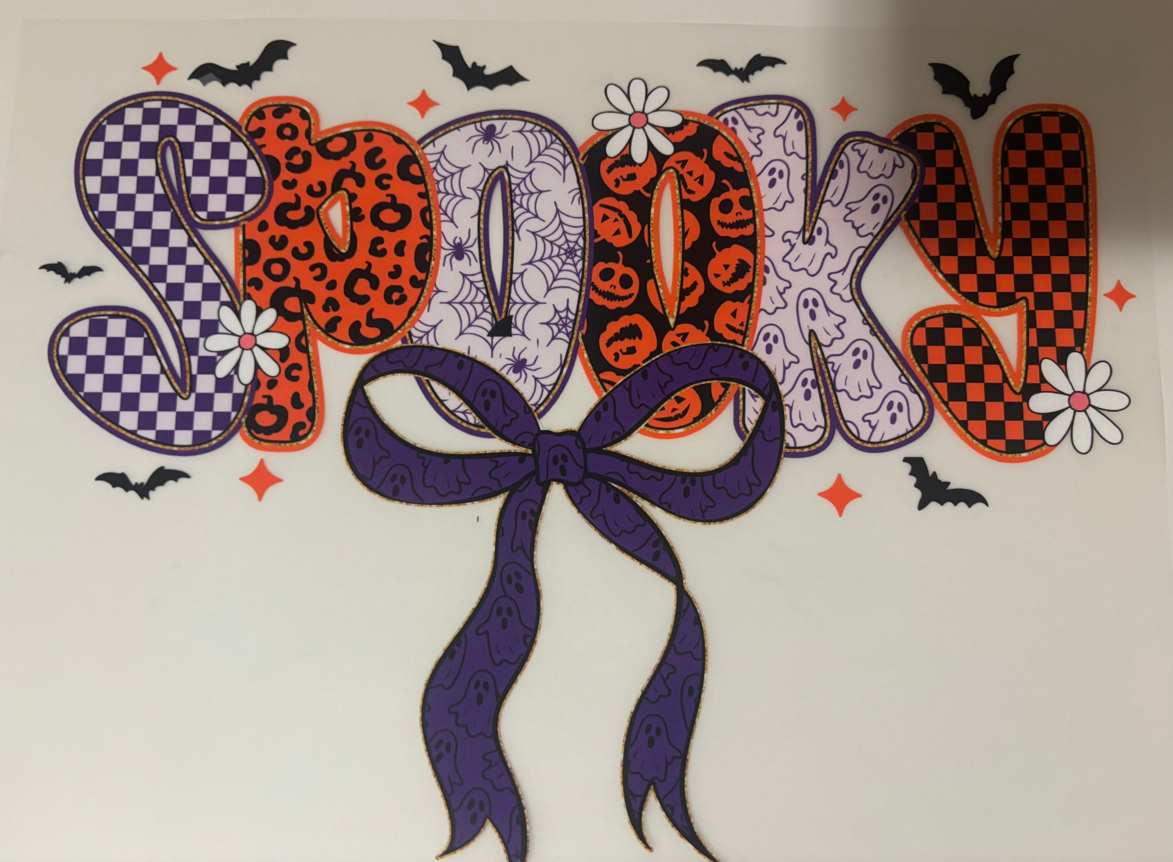 Purple bow spooky tee design